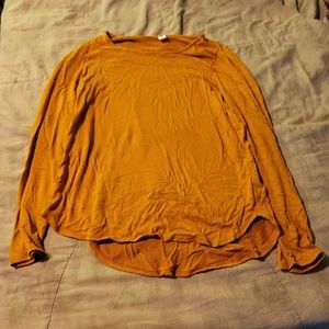Orange long sleeved top